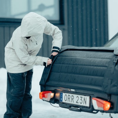 Thule Onto 2 storage box  closed being zipped up with lights on