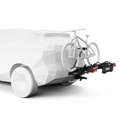Thule Outpace 3 bike carrier on towbar on car with bike on