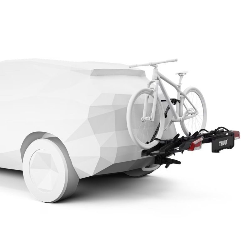 Thule Outpace 3 bike carrier on towbar on car with bike on