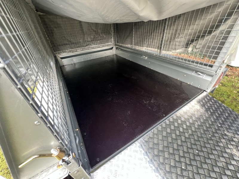 Ifor Williams GX85 ramp plant trailer with extended mesh sides and grey PVC cover