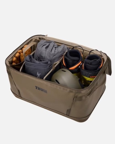 Thule Chasm Gear Hauler 80L Black Open with stuff inside with divider