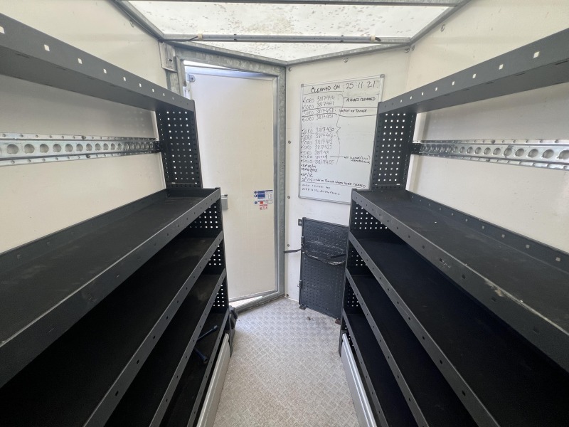 Used 2018 Ifor Williams BV125G twin axle enclosed box van trailer with internal shelving, rear barn doors and aluminium floor