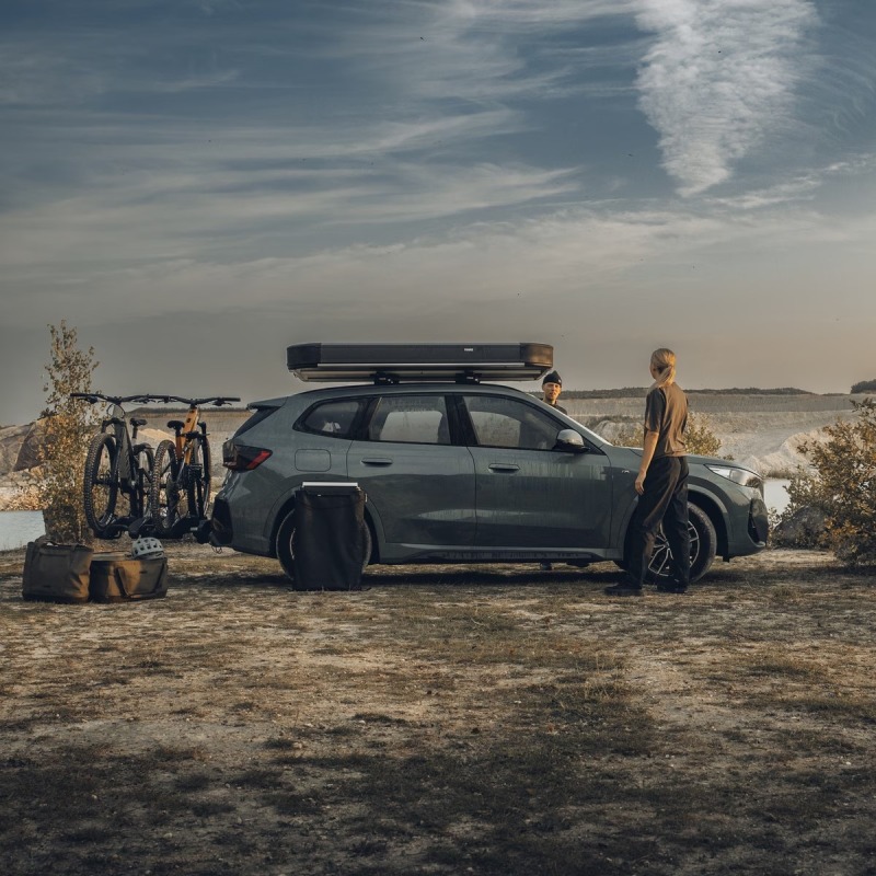 Thule Widesky roof top tent hard shell on car roof folded closed wide view