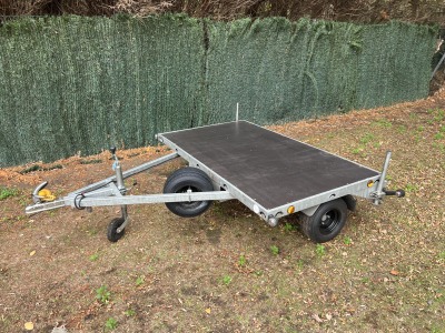Used Leyland Leisure flatbed motorbike trailer with folding aluminium loading ramps, spare wheel and new tyres