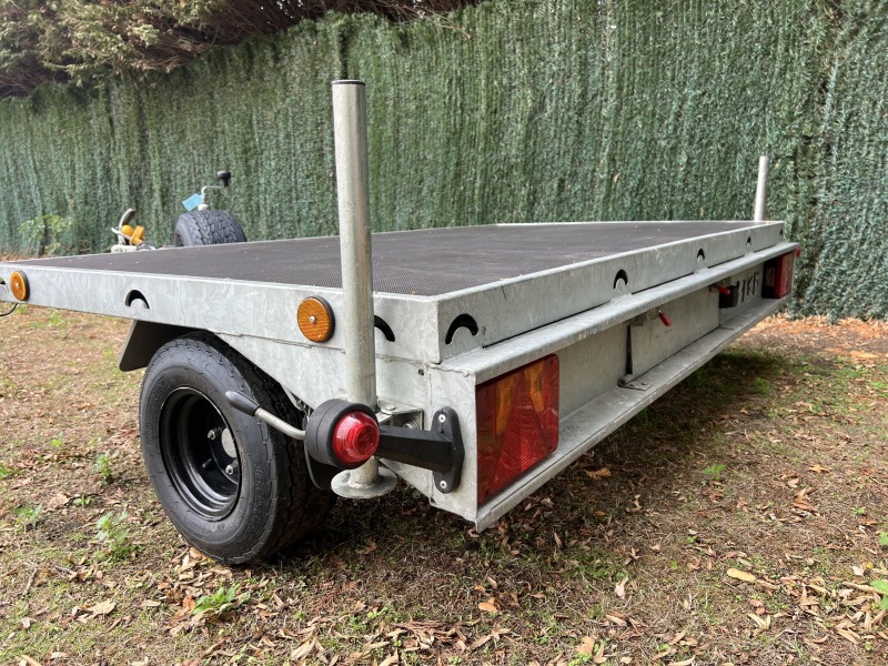 Used Leyland Leisure flatbed motorbike trailer with folding aluminium loading ramps, spare wheel and new tyres