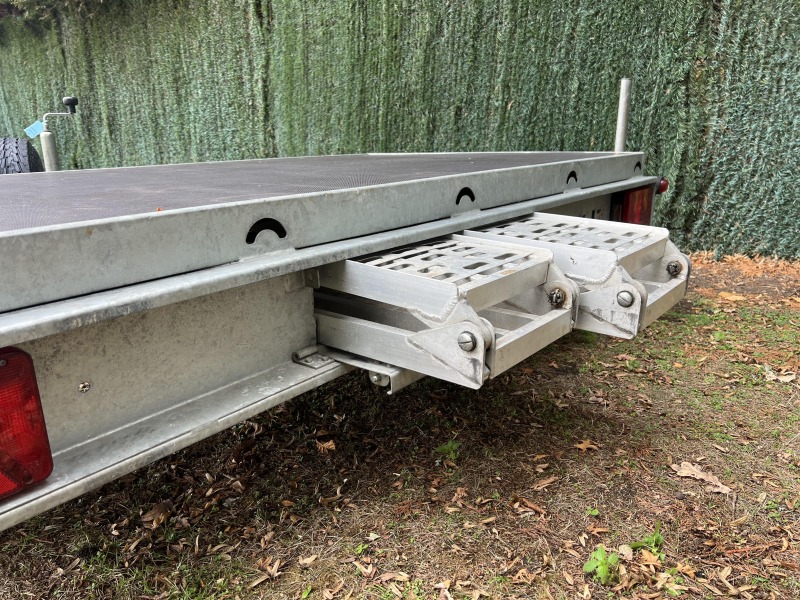 Used Leyland Leisure flatbed motorbike trailer with folding aluminium loading ramps, spare wheel and new tyres