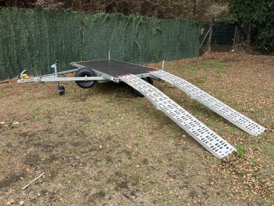 Used Leyland Leisure flatbed motorbike trailer with folding aluminium loading ramps, spare wheel and new tyres