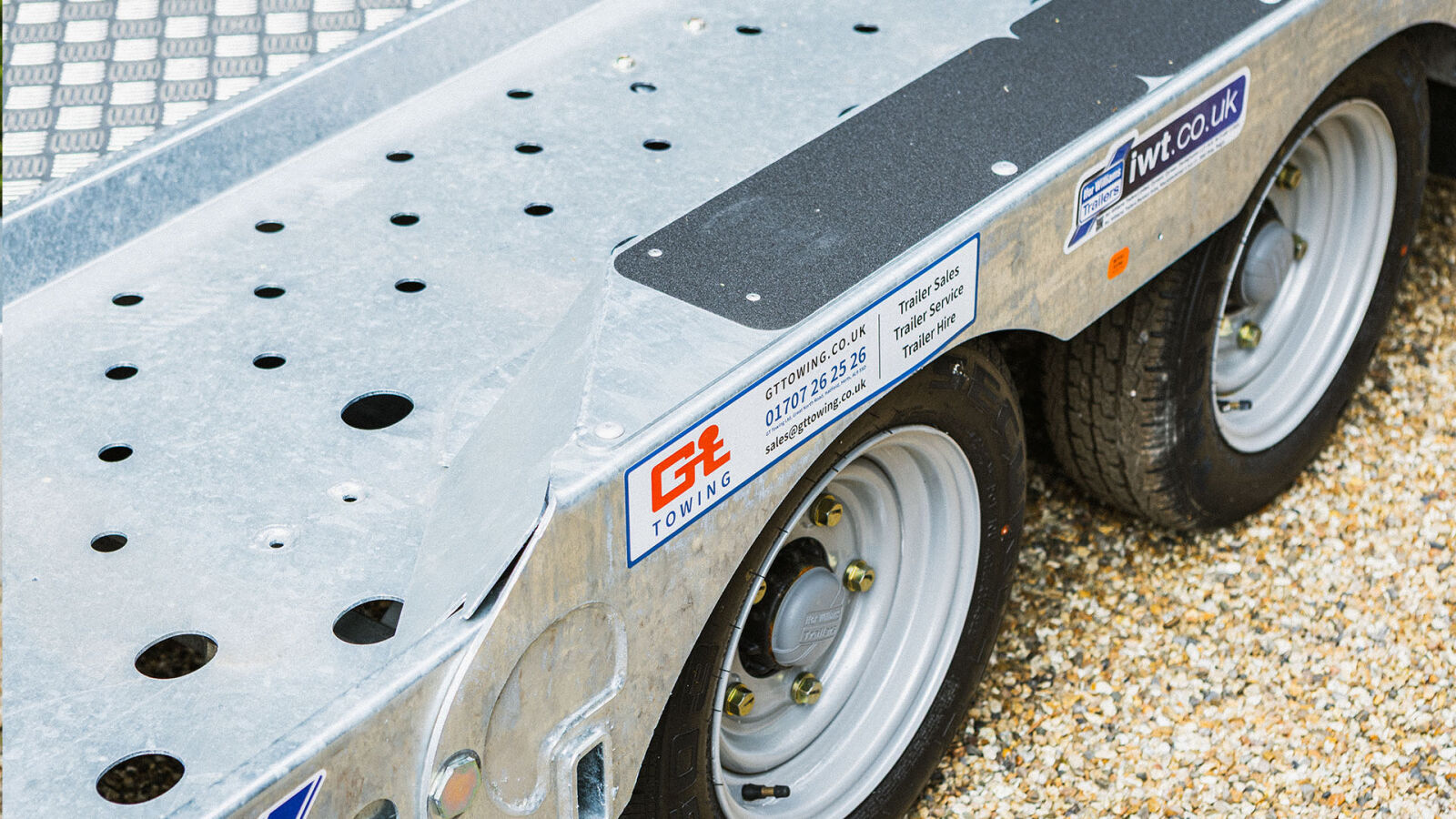 Close-up view of the side of a trailer and its fittings